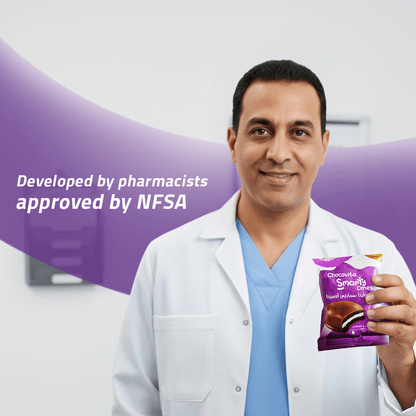 Man in a white coat holding Vitamin-fortified Marshmallow Chocolate Sandwich developed by pharmacists and approved by NFSA.