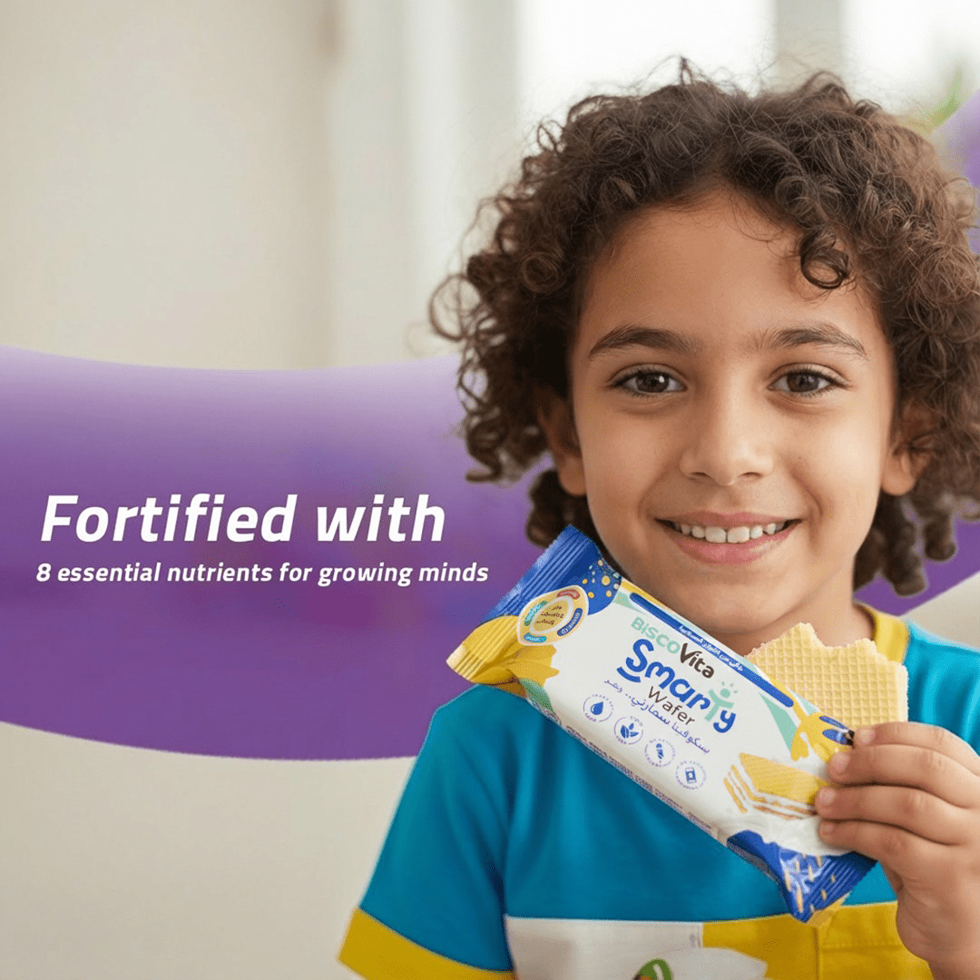 Child holding aSmarty Vanilla Milk Wafer Fortified with Vitamins and Minerals for growing minds